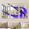 jacaranda living room purple tones silver trim moder wall mirror