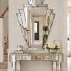 Babushka Art Deco fan wall mirror with clear mirrored sections and silver trim, handmade by Mirror Mania in Norfolk, displayed above a mirrored hallway console table.
