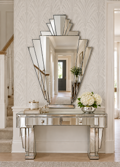 Babushka Art Deco fan wall mirror with clear mirrored sections and silver trim, handmade by Mirror Mania in Norfolk, displayed above a mirrored hallway console table.
