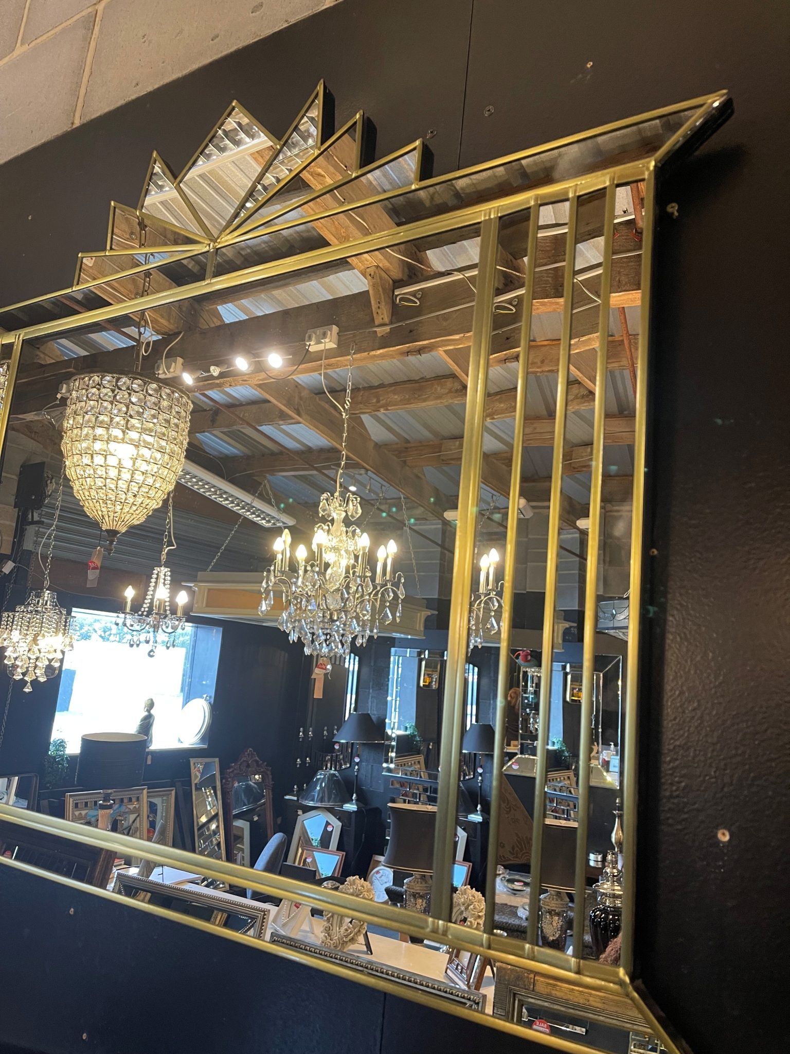 The Hobart Mirror is a stunning Art Deco over-mantle wall mirror, exclusively designed and handcrafted by British mirror artist Phillip Orr in our Norfolk workshop. This luxurious mirror features a bold central panel surrounded by angled mirrored sections and finished with a striking fan-shaped crown – a classic Art Deco statement for elegant interiors.