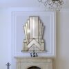Aurora room setting 4 cropped art deco over mantle wall mirror