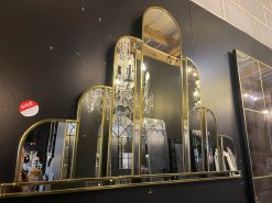 The Turin Handmade Original Art Deco Over Mantle Wall Mirror has been crafted in our Norfolk workshop and is exclusively available from MirrorMania. This stunningly exquisite, art deco mirror which you would call 'wow' but we call Turin, features a total of 14 hand-cut pieces of mirror. The sweeping central domed panel is bordered by clear slightly angled sections of shaped mirro