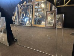 Venice is a beautifully shaped mirror with presence that will add style to any room – exclusively designed and handcrafted by Mirror Mania A large central mirror is bordered by two smaller sections of mirror and finished with a silver trim.