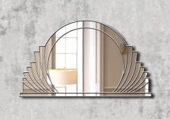 Messina Majesty Deco Mirror: A stunning Art Deco masterpiece with a central circular mirror, surrounded by gracefully sweeping mirror sections, featuring radiant gold trim. Handcrafted by artist Phillip Orr exclusively for Mirror Mania in Norfolk, England. Customizable in black or silver trim, this timeless design boasts beautiful symmetric curves, offering a touch of sophistication to any space.